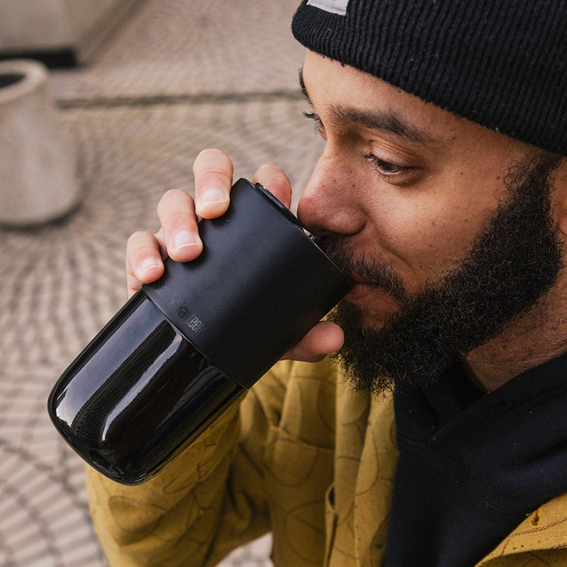 16oz-rise-tumbler-b2 16oz_rise_tumbler_black_man_drink_square.jpg