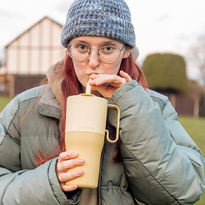 26oz-rise-tumbler-with-straw-lid-f4 26oz_rise_rumbler_straw_wax_yellow_woman_sip_square.jpg