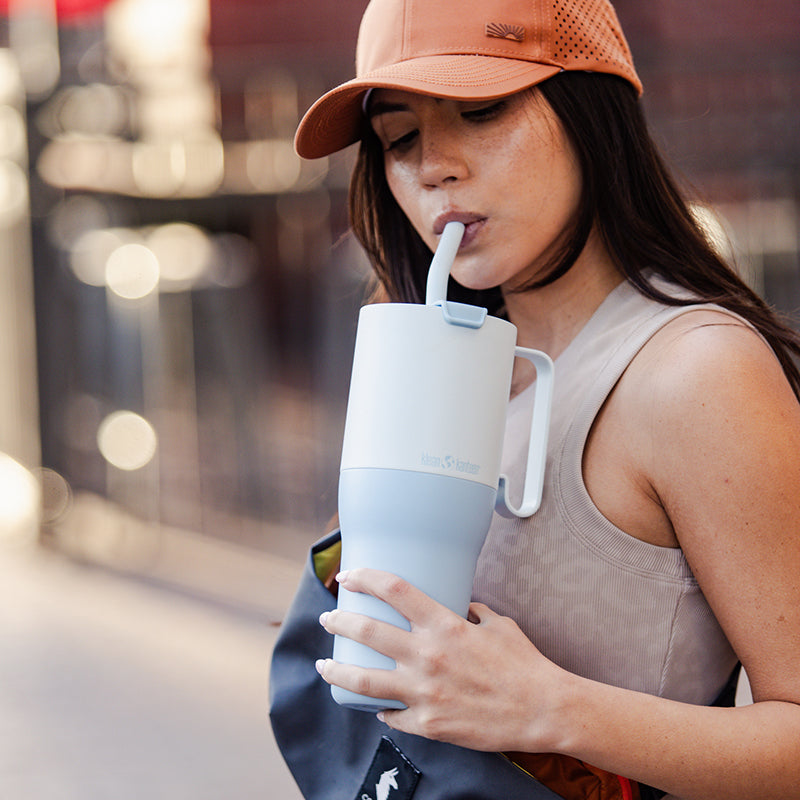 36oz-rise-tumbler-with-straw-lid-b1 36oz_rise_tumbler_straw_girl_sip_square.jpg