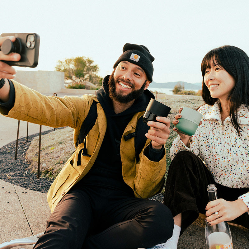 bring-your-own-party-kit-tumblers-and-cocktails-z3 8oz_rise_lowball_black_iceberg_couple_selfie_city_square.jpg