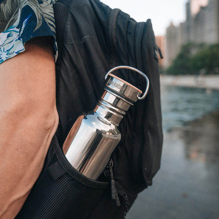27oz-reflect-with-bamboo-cap-k2 K27SSLRF-MS-BAMBOO_reflect-bottle_backpack_lifestyle.jpg
