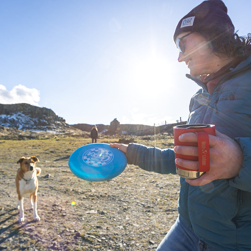 12oz-camp-mug-z7 insulated_camp_mug_12oz_woman_dog_frisbee_square.jpg