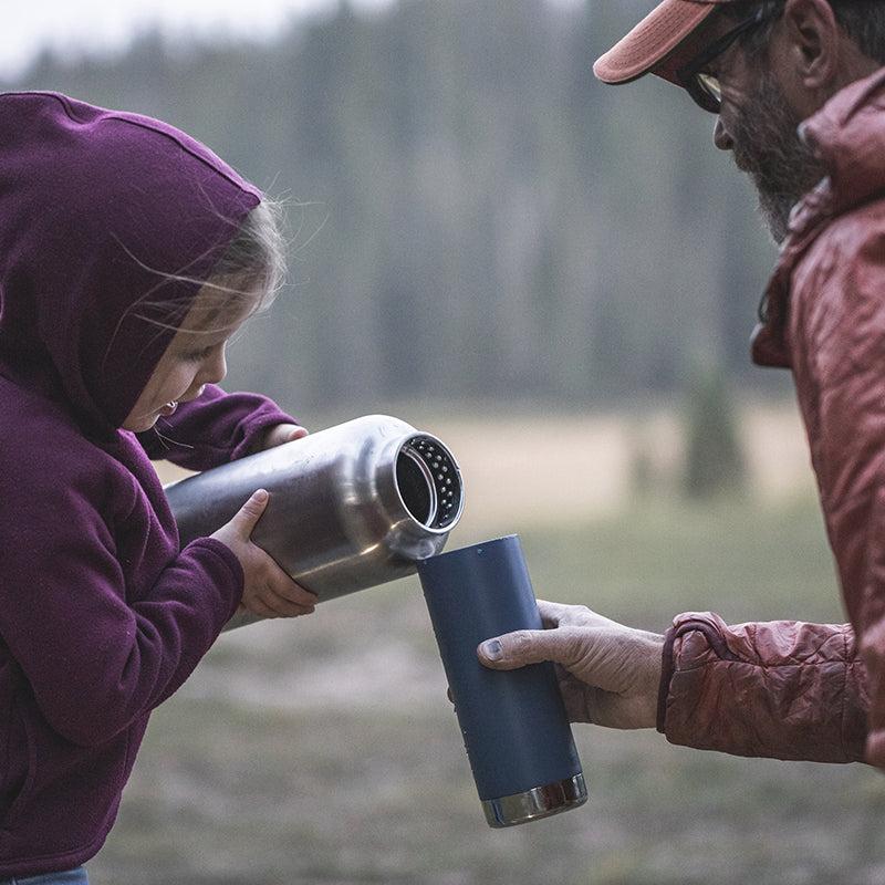 64oz-tkwide-with-loop-cap-w0 tkwide_64oz_bottle_girl_dad_filling_square.jpg